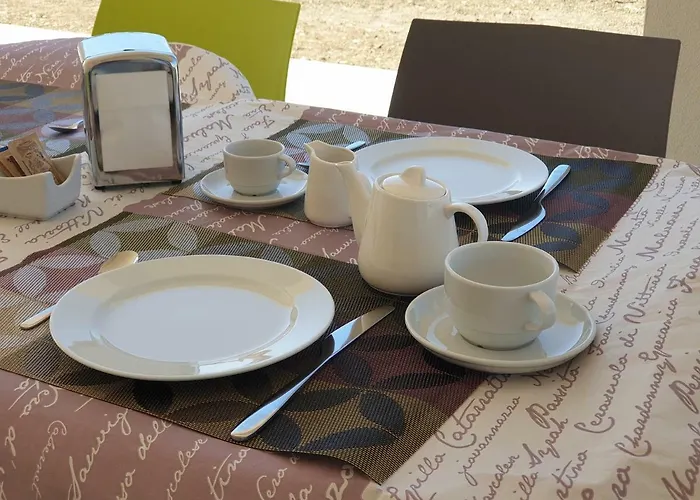 Bed and breakfast L'eden Di Capo Bianco 4*